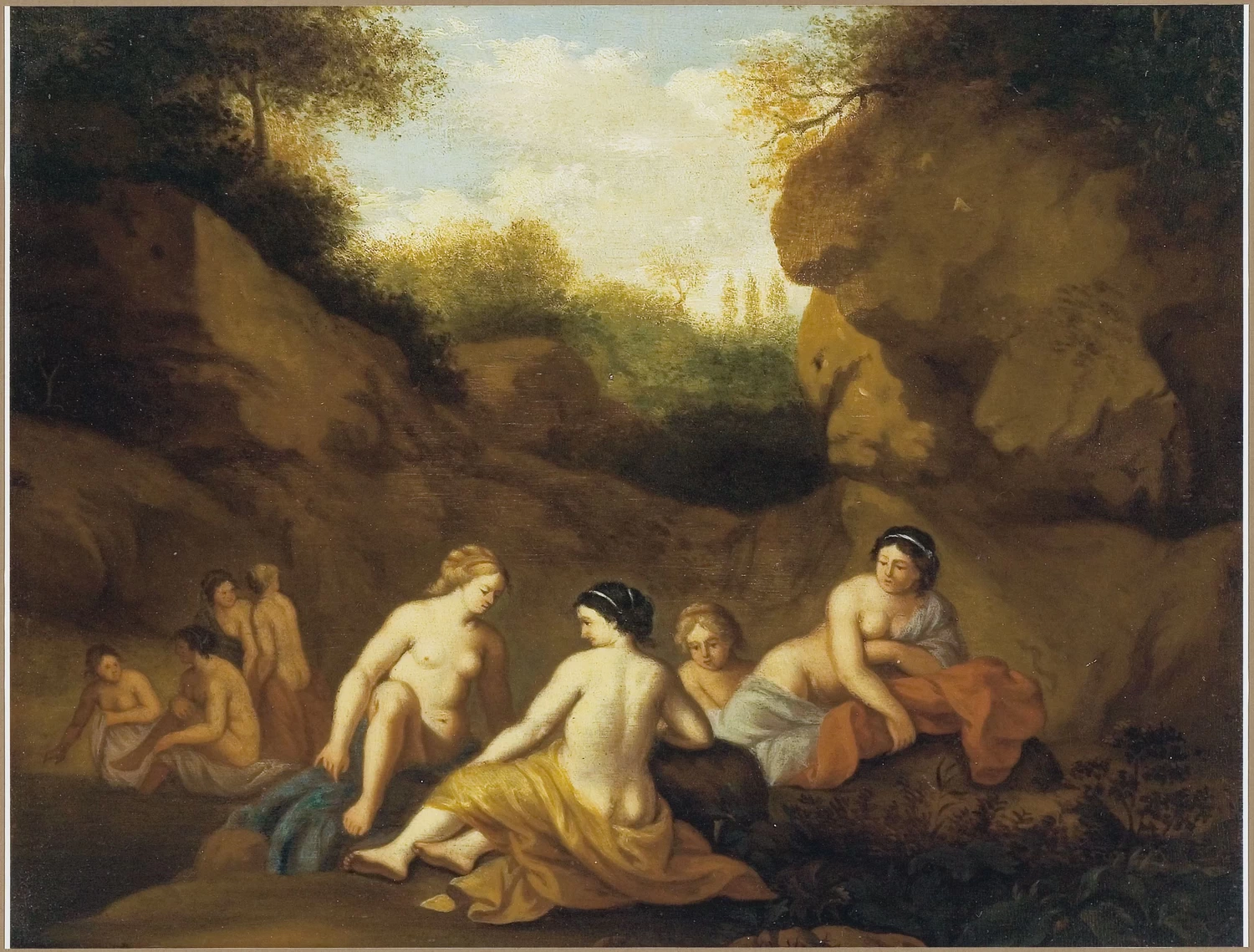 Ninfe che fanno il bagno vicino a una parete rocciosa
